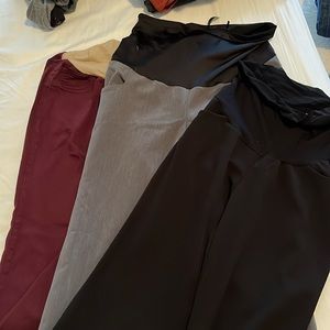 Three maternity pants. Two dress pants and one burgundy.